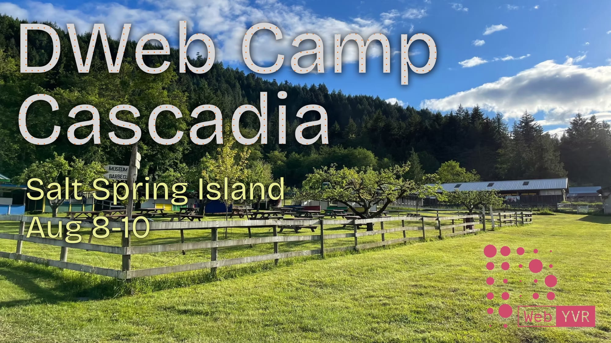 Pastoral image of a rural property with a wooden fence. Text overlay: DWeb Camp Cascadia, Salt Spring Island Aug 8-10